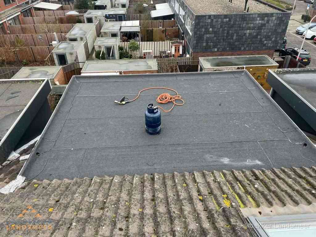 Dakreparatie plat dak met bitumen in Landsmeer